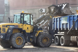 Skip Hire in Brentwood loading a lorry for transfer